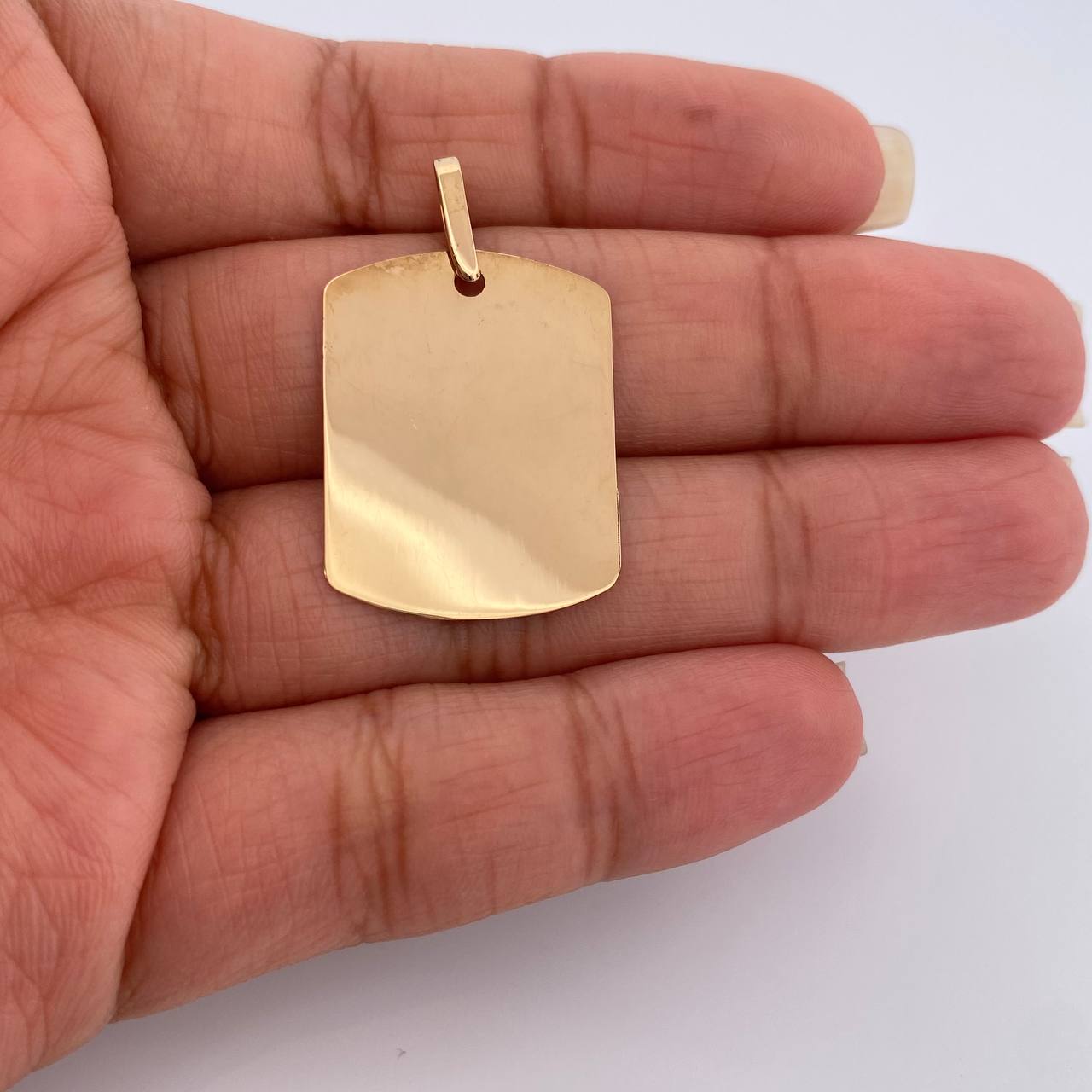 Dije Placa  1.6gr / 3.3cm / Oro Amarillo 18K $