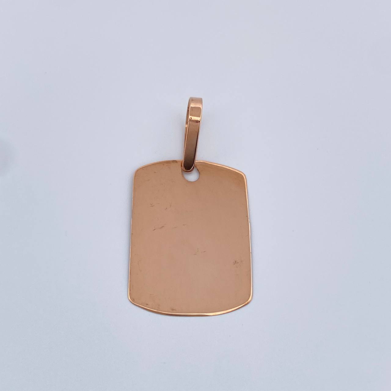 Dije Placa 0.8gr / 2.8cm / Oro Rosa 18K $