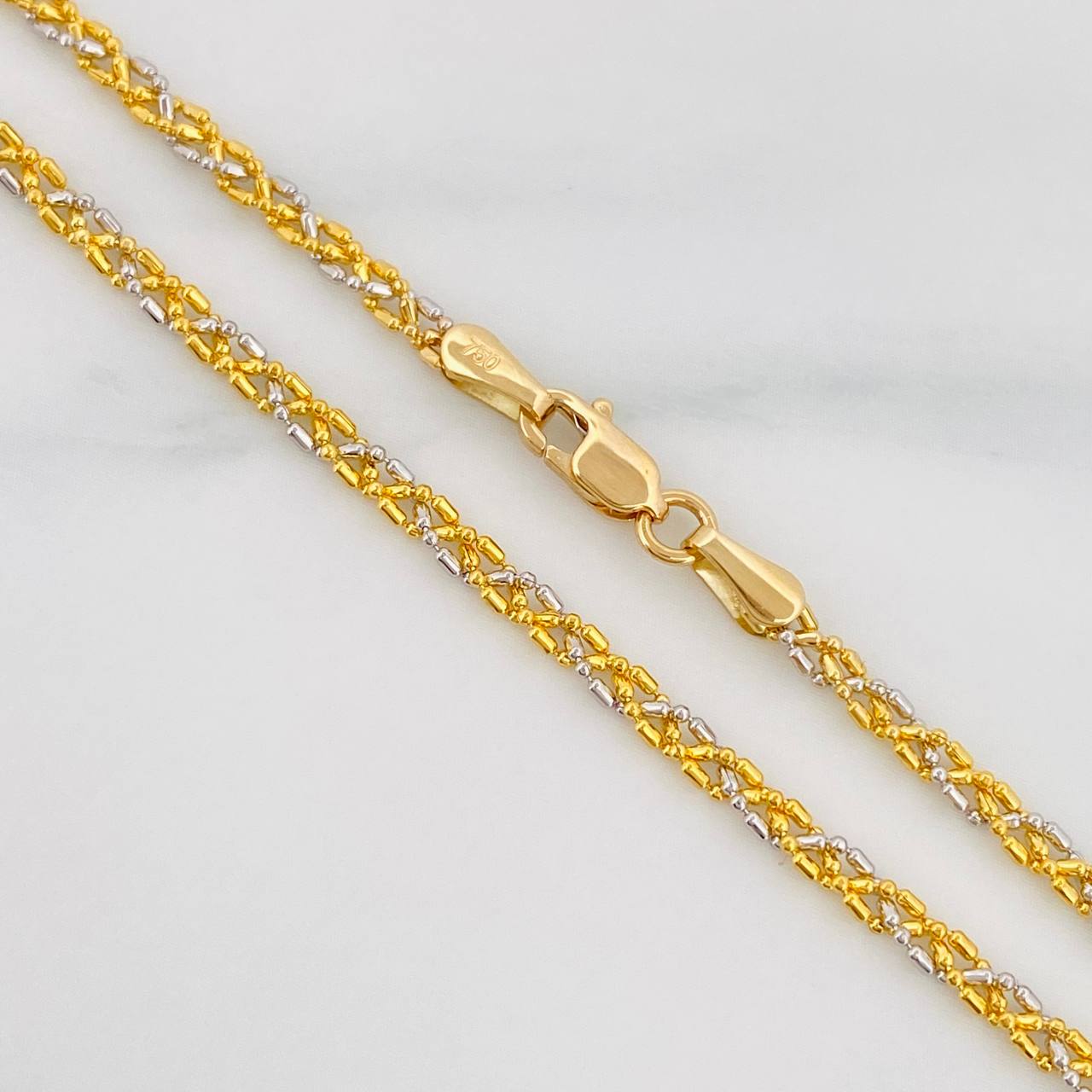 Cadena Morse 8.15g / 70cm / 2.28mm Dos Oros Amarillo Blanco 18K