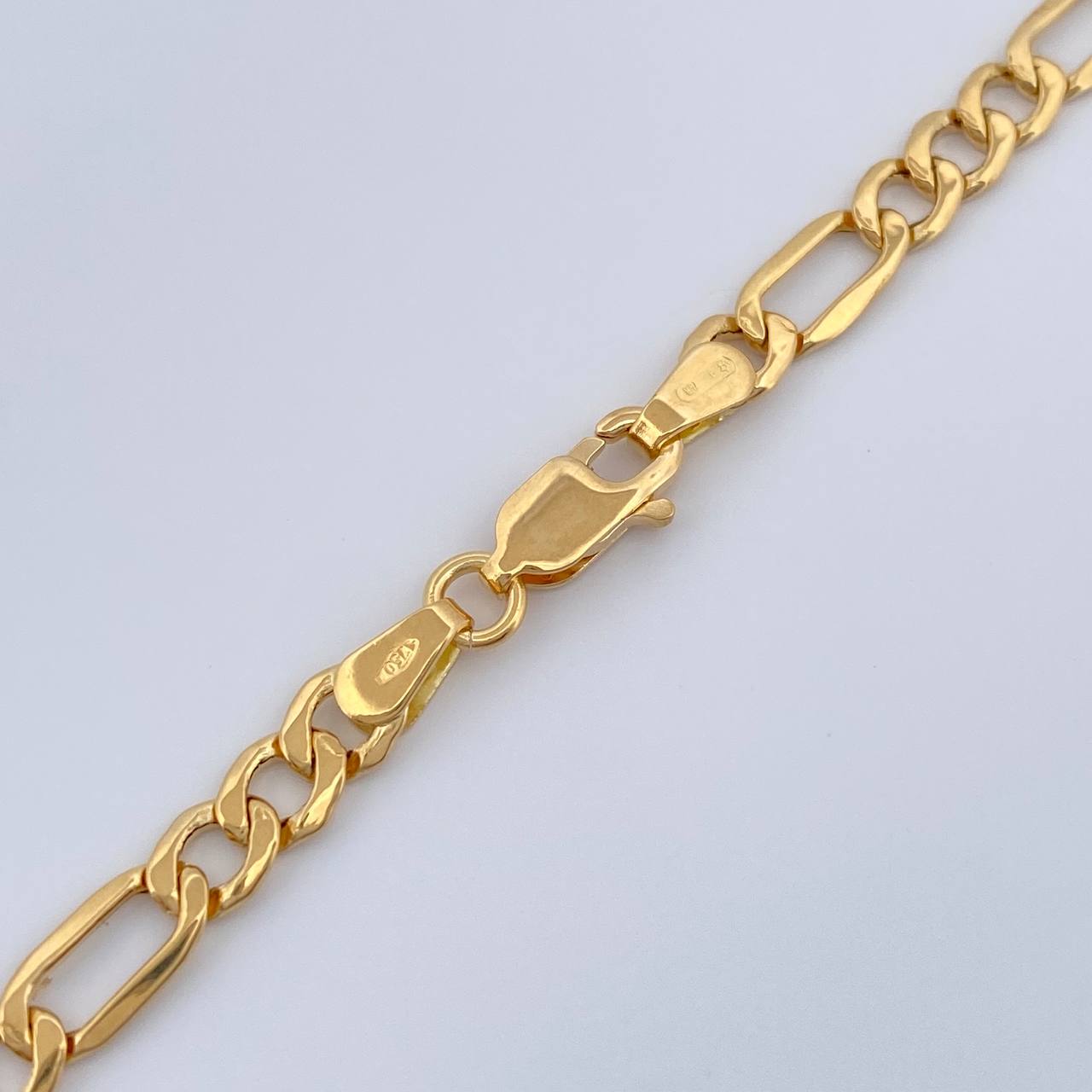 Cadena Figaro 8.85gr / 60.6cm / 4mm Oro Amarillo +1 18K $