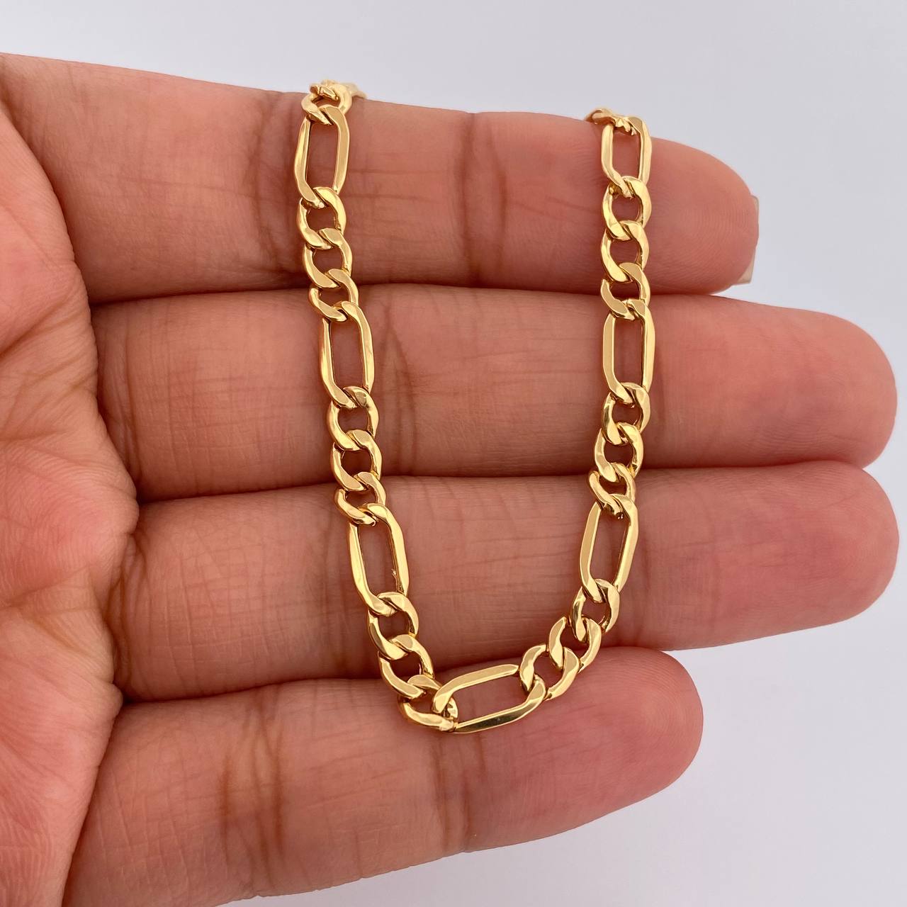 Cadena Figaro 9.25gr / 60.5cm / 4.13mm Oro Amarillo +1 18K $