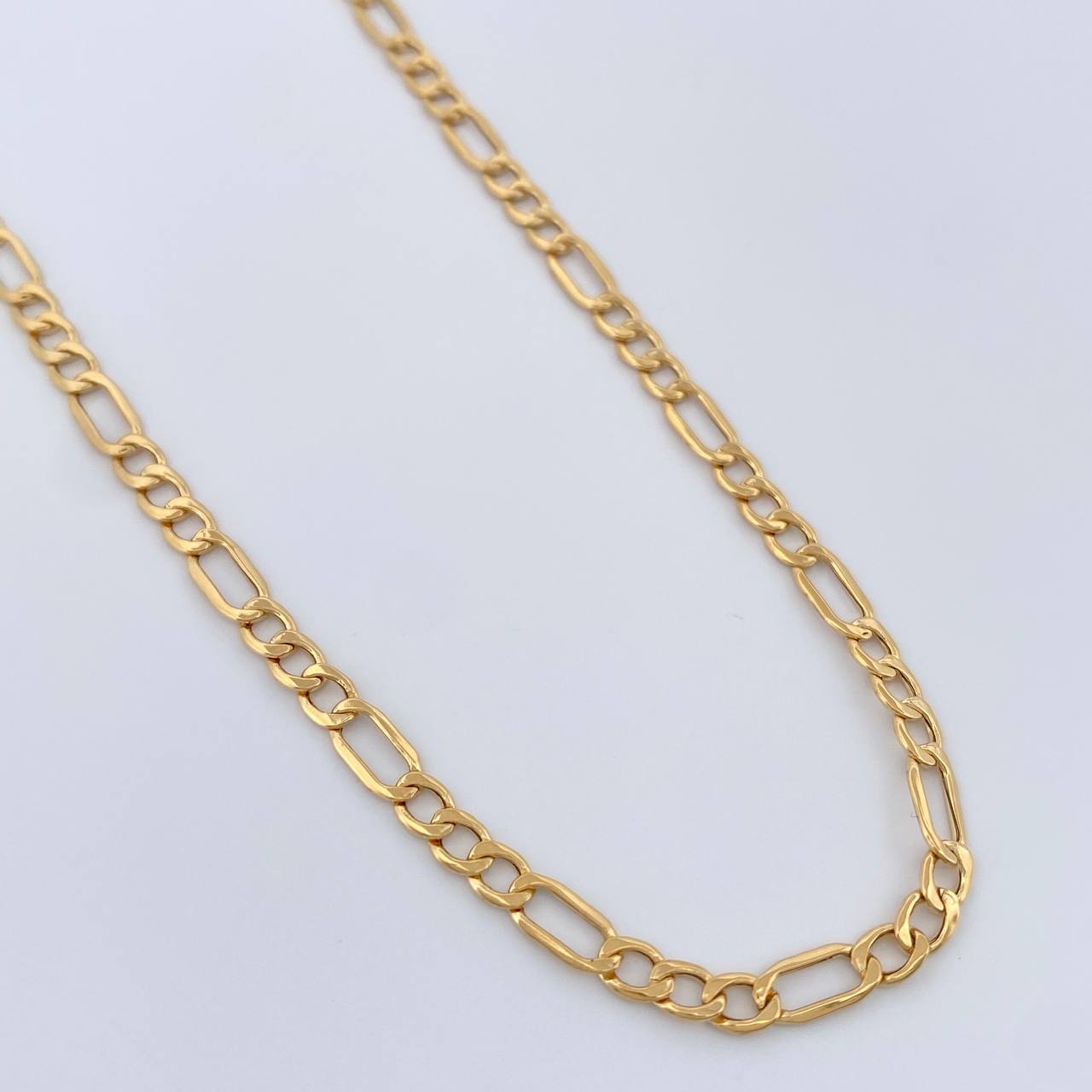 Cadena Figaro 1.75gr / 46cm / 2.38mm Oro Amarillo +1 18K $