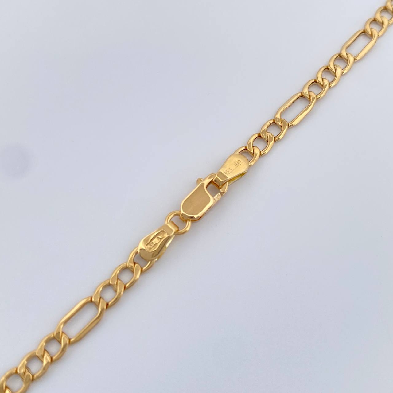 Cadena Figaro 1.75gr / 46cm / 2.38mm Oro Amarillo +1 18K $