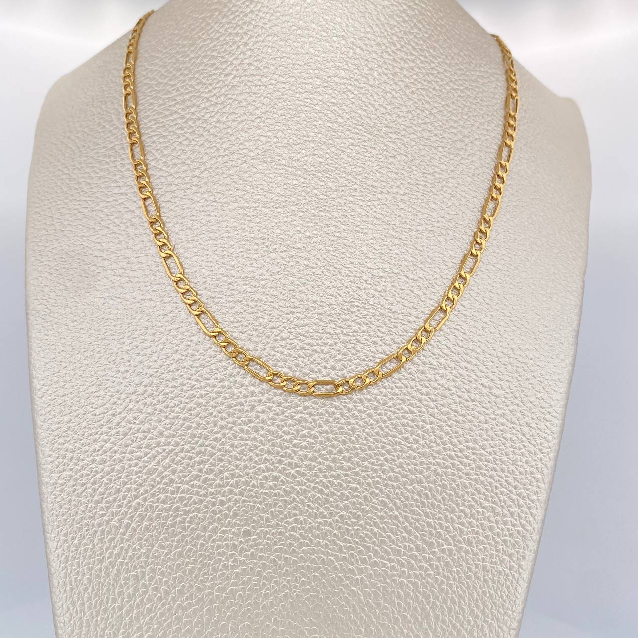 Cadena Figaro 1.75gr / 46cm / 2.38mm Oro Amarillo +1 18K $