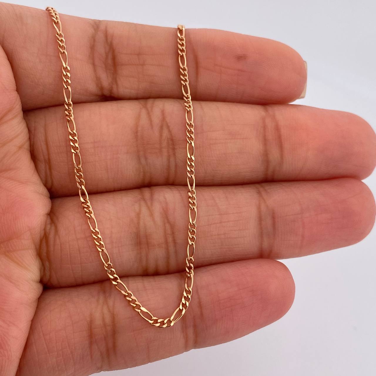Cadena Figaro 1.4gr / 44.5cm / 1.3mm Oro Rosa +1 18K $