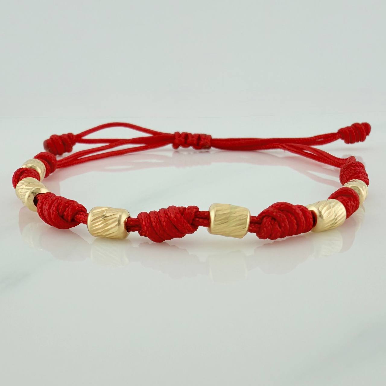 Pulsera Tejida Roja Cilindros Diamantados 0.7gr / 4mm Oro Amarillo 18K (A.C)