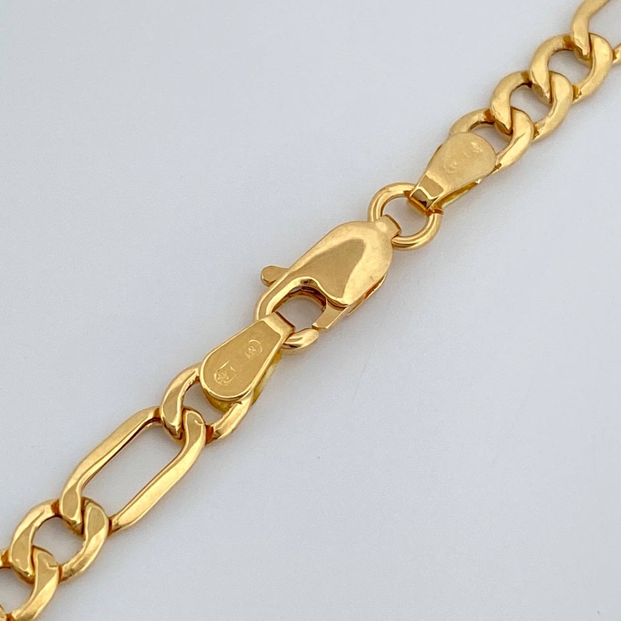 Cadena Figaro 9.15gr / 60.5cm / 4.4mm Oro Amarillo +1 18K %