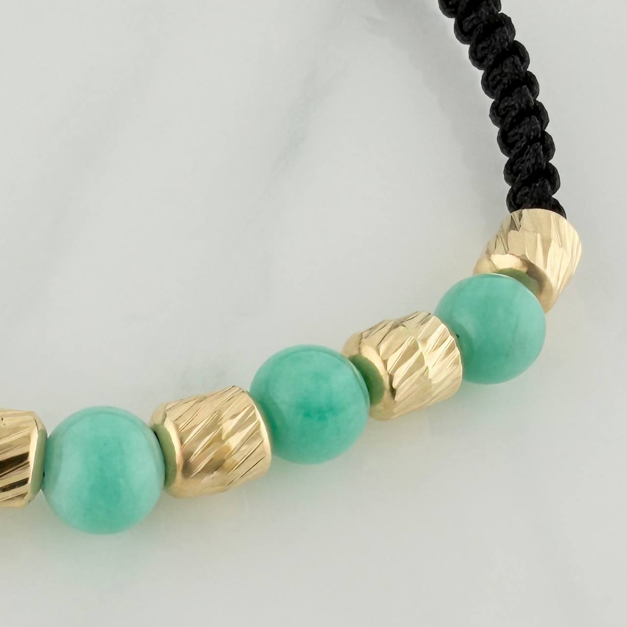 Pulsera Tejida Negra Morralla Esmeralda 5 Und Oro Amarillo 18K