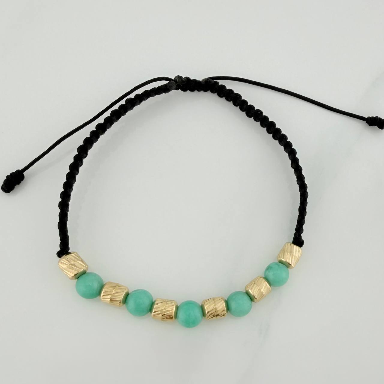 Pulsera Tejida Negra Morralla Esmeralda 5 Und Oro Amarillo 18K
