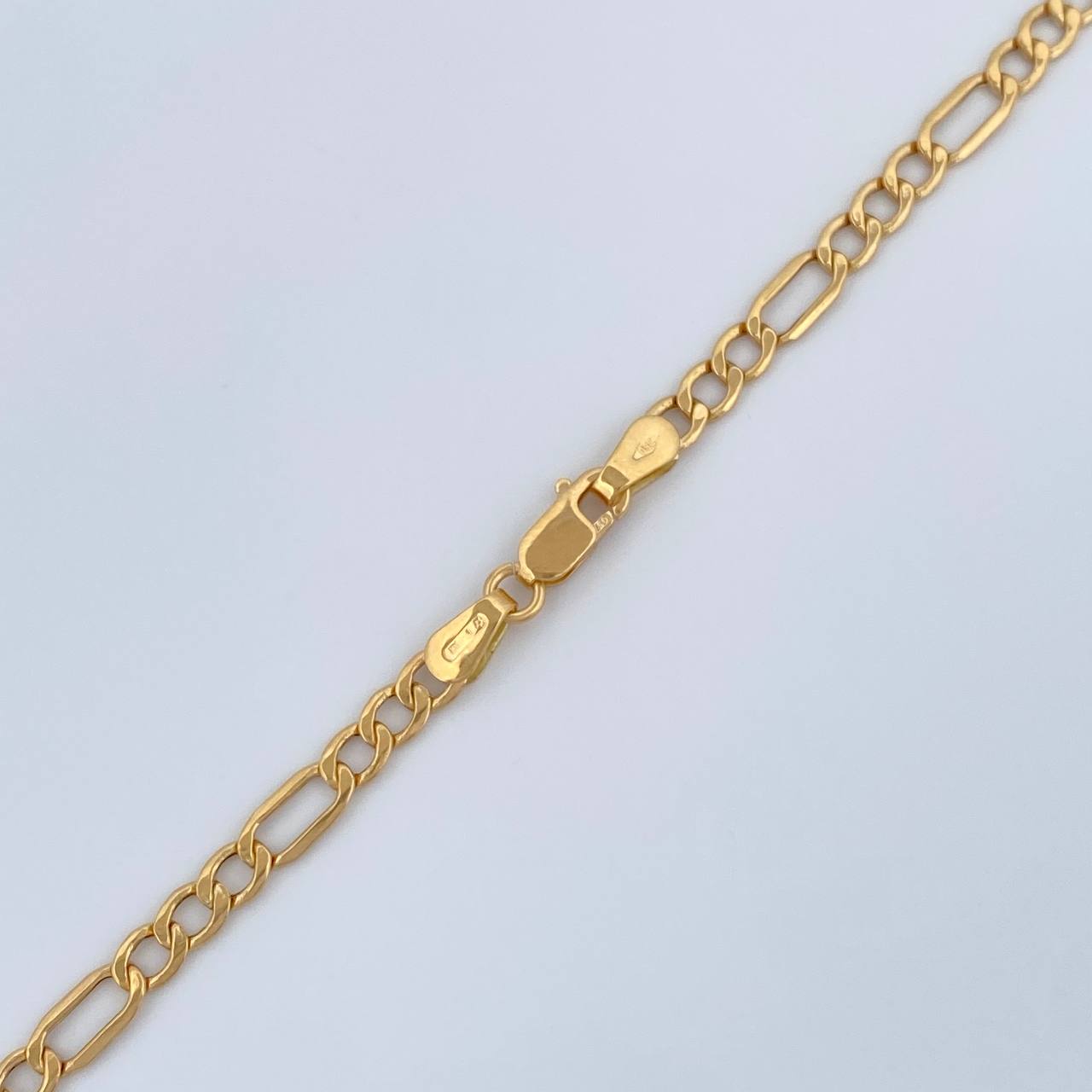 Cadena Figaro 5.5gr / 60.6cm / 3.38mm Oro Amarillo +1 18K &
