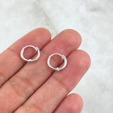 Candongas Kona 1.15gr / 0.6cm / Lisas Oro Blanco 18K *