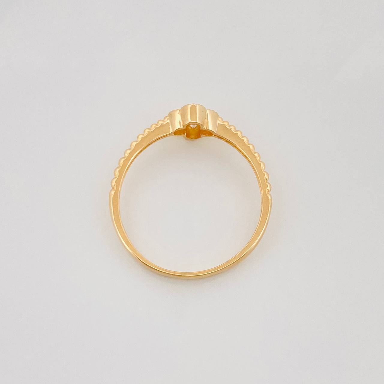 Anillo Flor Borde Texturizado 1.45g / T6 Oro Amarillo 18K