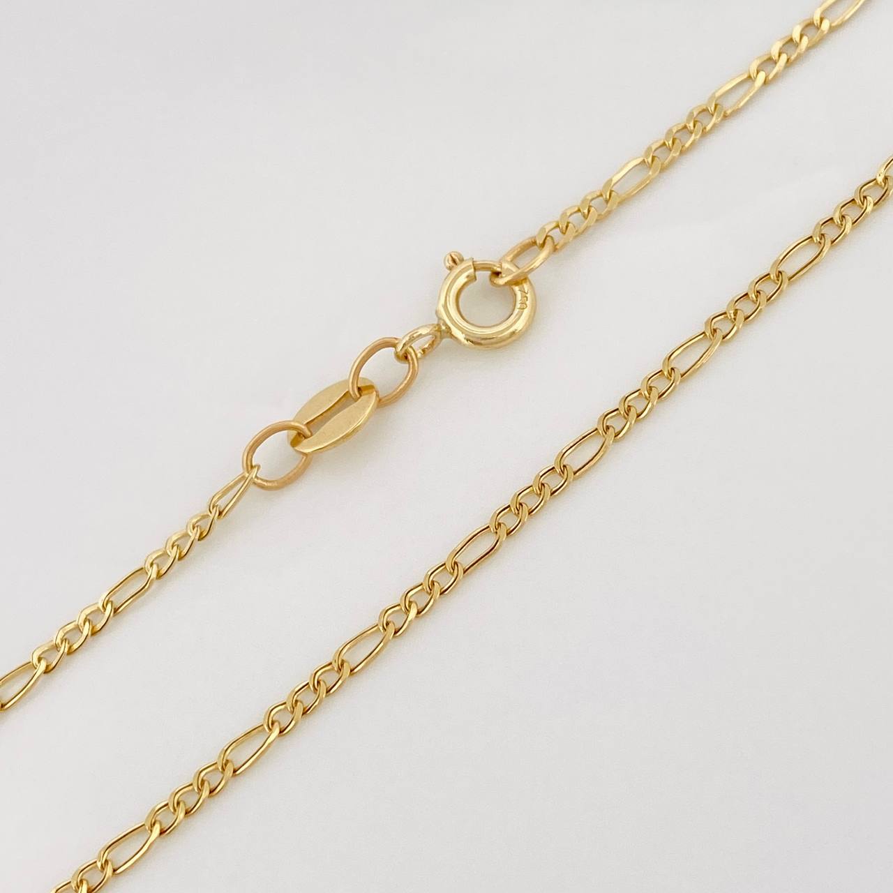 Cadena Figaro 1.3g / 45cm / 1.55mm Oro Amarillo 18K