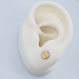 Topos Medalla Corona 0.65gr / 6.05mm Oro Amarillo 18K %