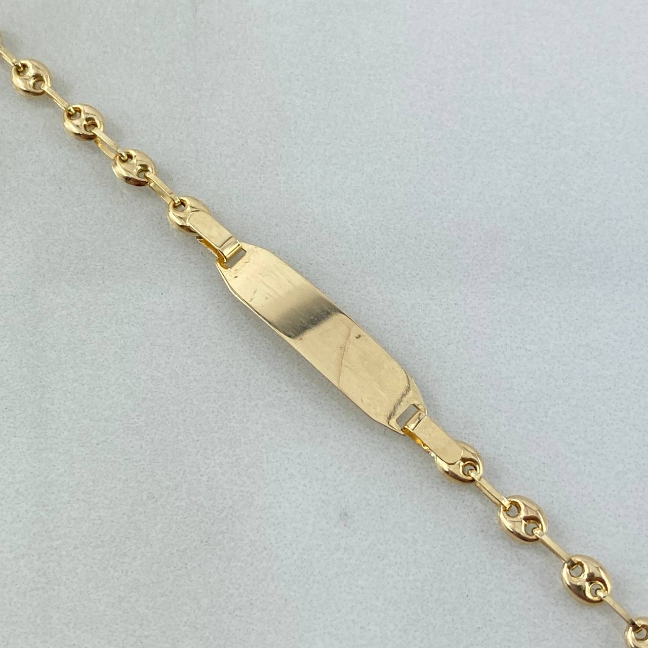 Pulso GC 2.25gr / 15.5cm / 3mm Placa Bebe Rectangulo Ovalo Curvo  Oro AmarilloႣ
