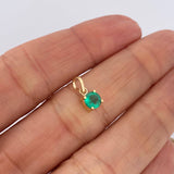 Dije Redondo Esmeralda 48Pts 0.5gr / 1.2cm / Oro Amarillo 18K $