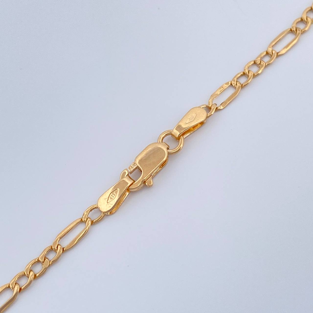 Cadena Figaro 1.7gr / 45.5cm / 2.7mm Oro Amarillo +1 18K %