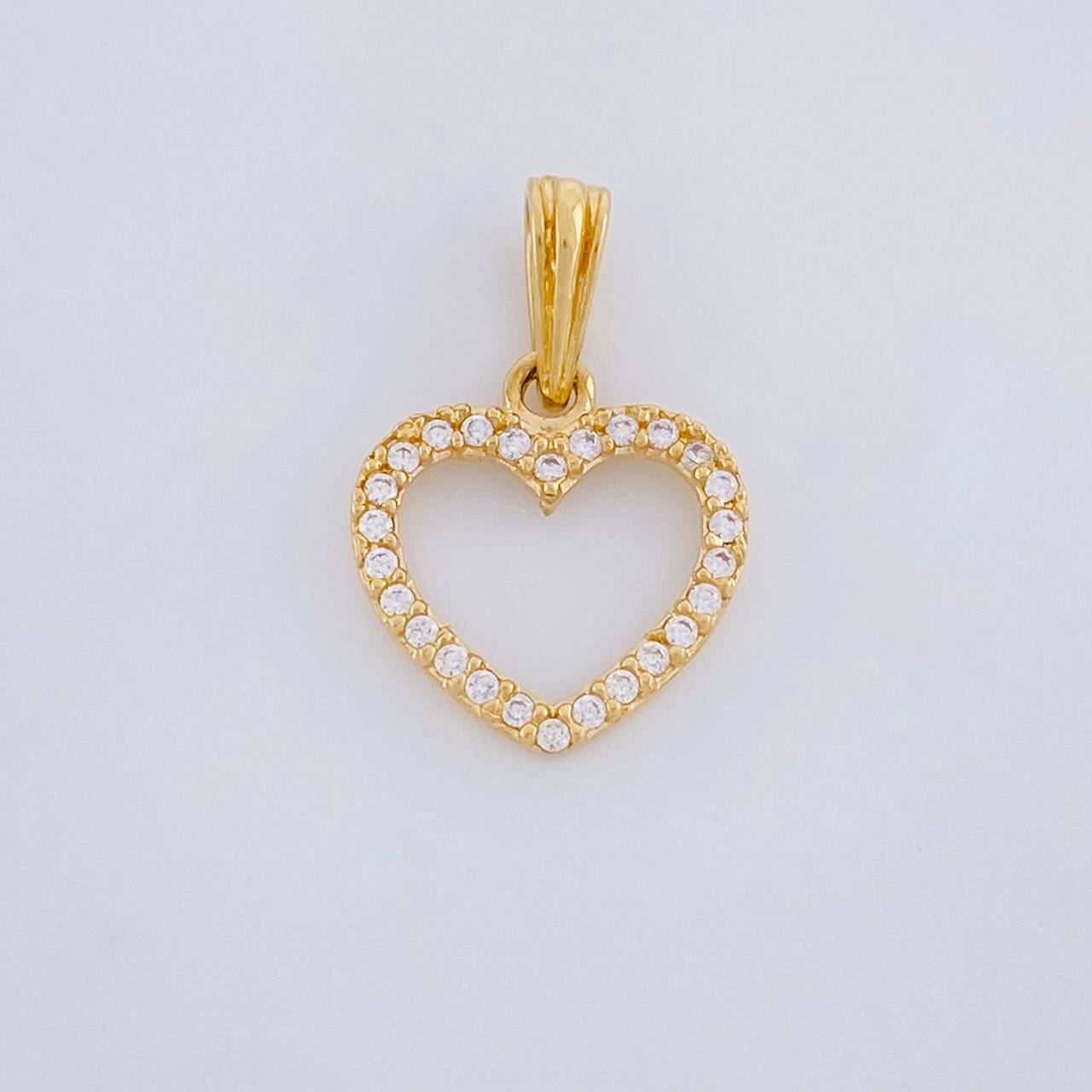 Dije Silueta Corazón Tupido 0.9g / 1.8cm Oro Amarillo 18K