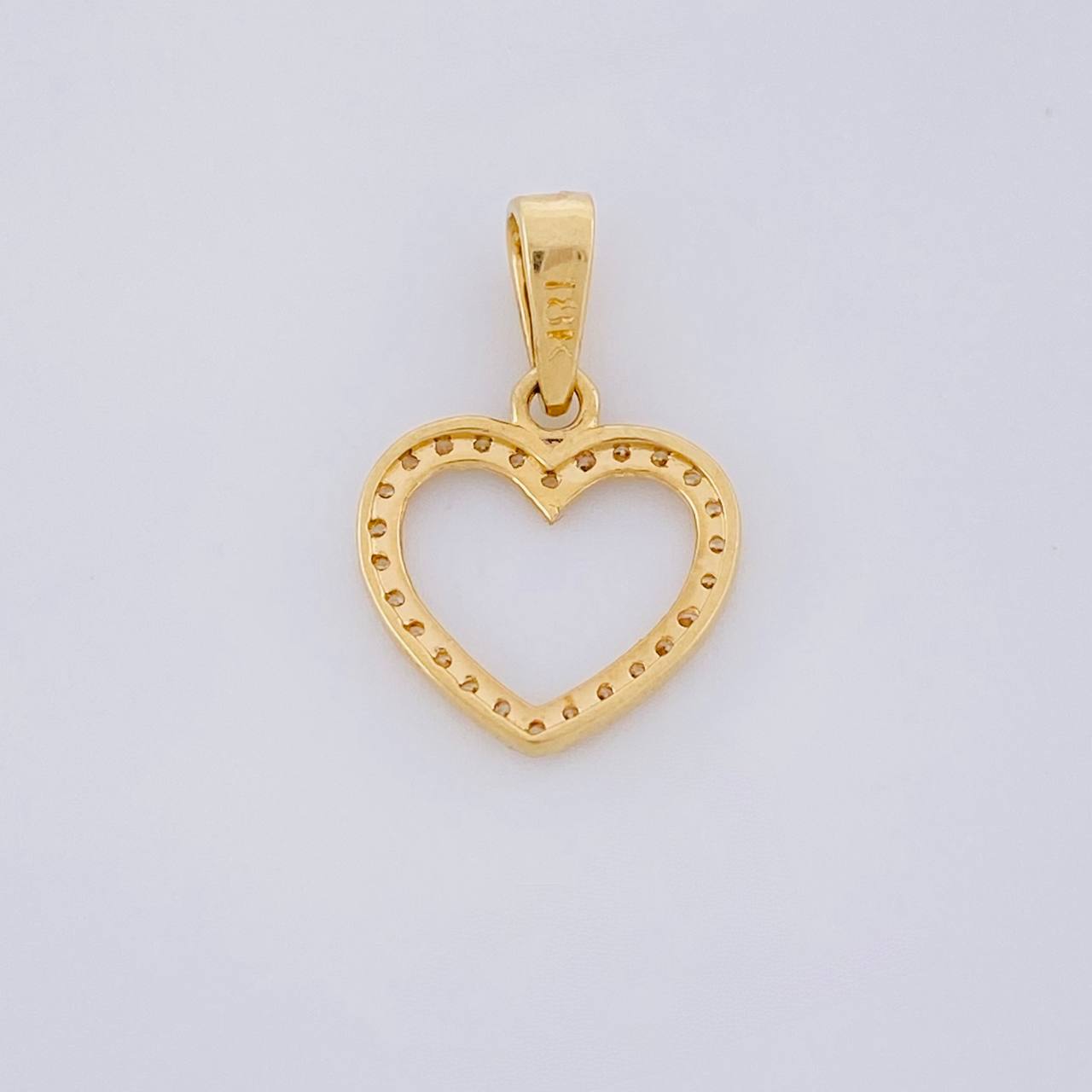 Dije Silueta Corazón Tupido 0.9g / 1.8cm Oro Amarillo 18K