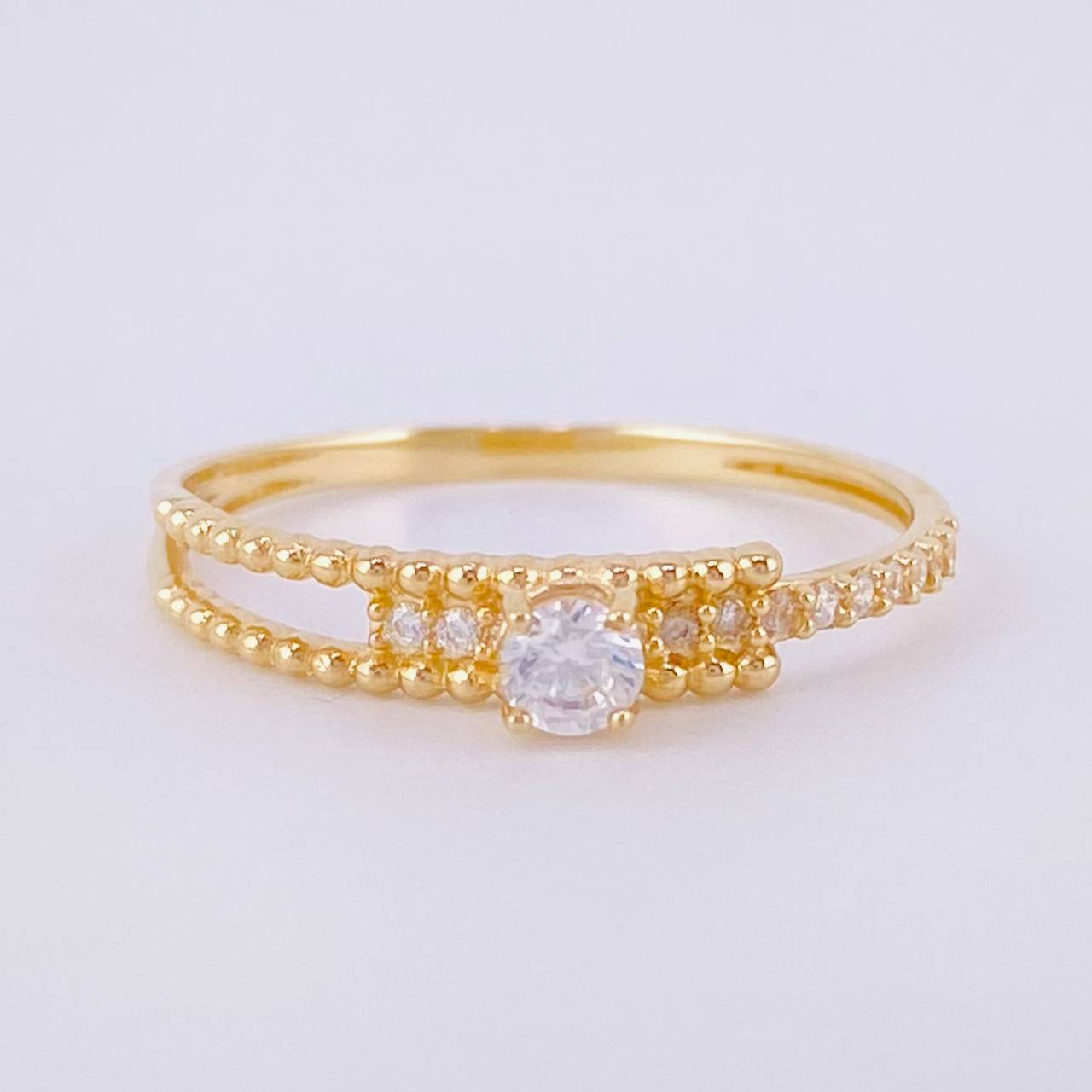 Anillo Solitario Medio Carril Tupido 1.25g / T5 3/4 Oro Amarillo 18K