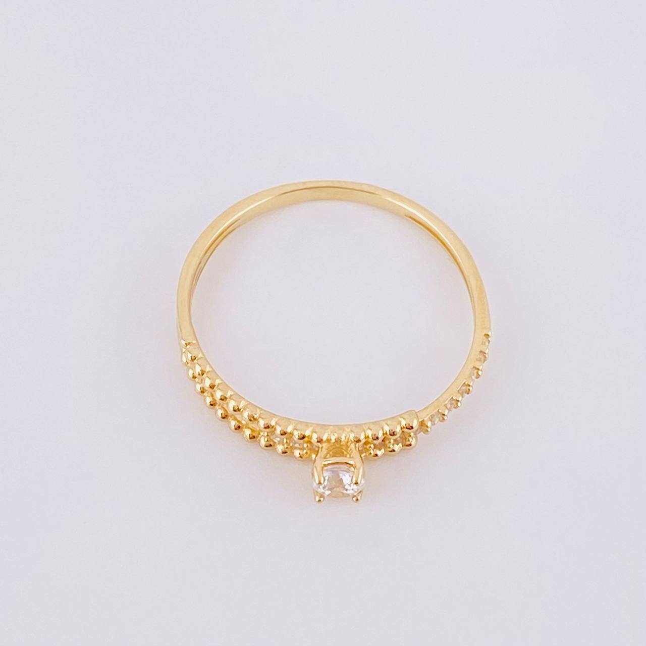 Anillo Solitario Medio Carril Tupido 1.25g / T5 3/4 Oro Amarillo 18K