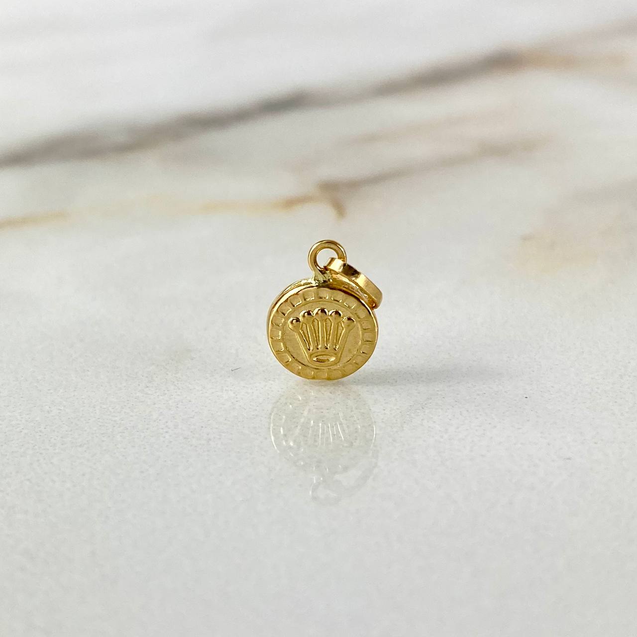 Dije Corona RX 0.3gr / 1.4cm / Oro Amarillo