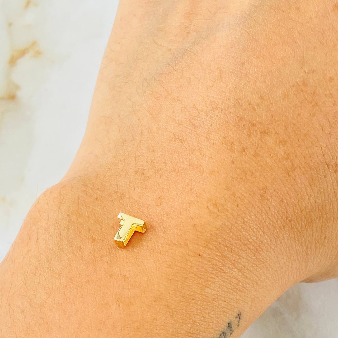Herraje Tambor Letra T 0.25gr / 6mm Oro Amarillo 18K