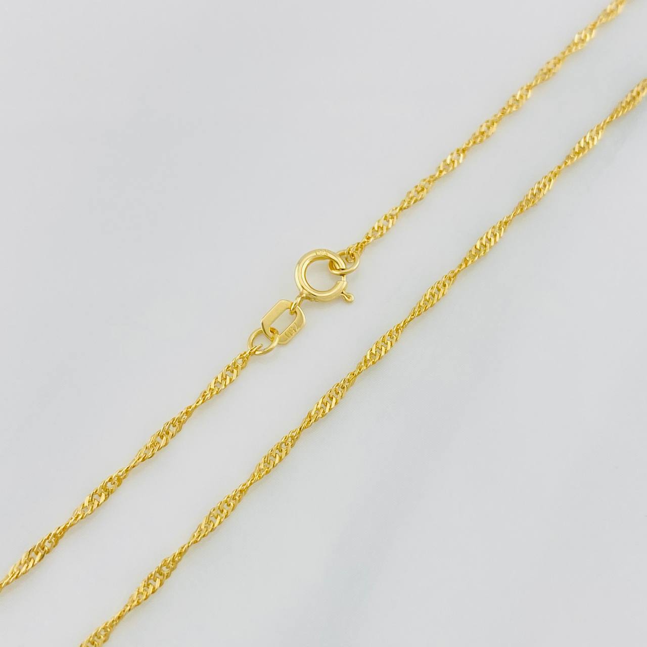 Cadena Singapur 1.25g / 60cm / 1.37mm Oro Amarillo 18K