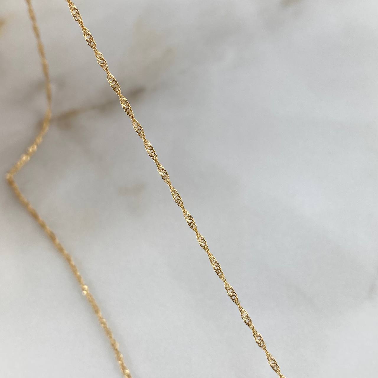 Cadena Singapur 1.1gr / 45cm / 0.6mm Oro Amarillo +3