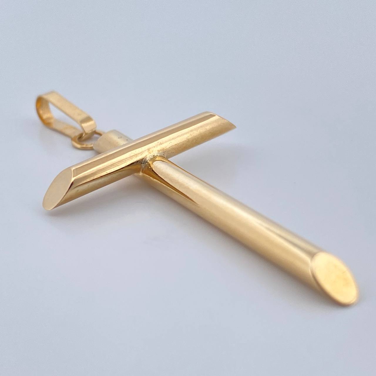 Dije Cruz 1.8gr / 4.8cm / Oro Amarillo 18K $