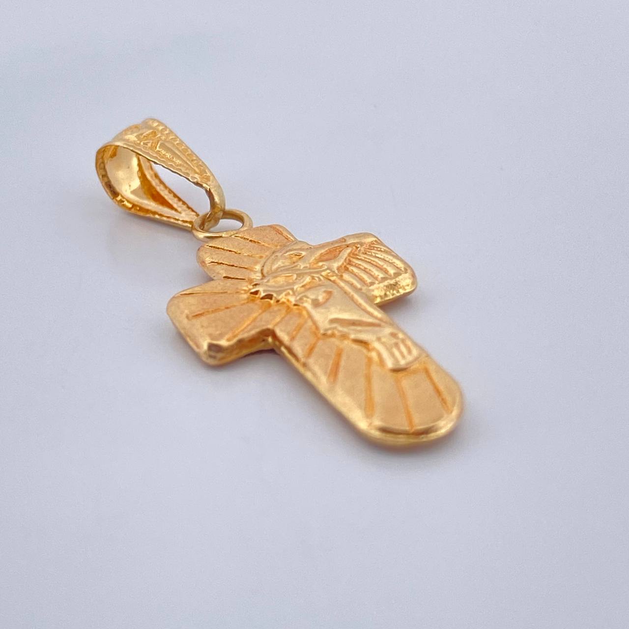 Dije Cruz Rostro Cristo 0.85gr / 2.6cm / Oro Amarillo 18K $