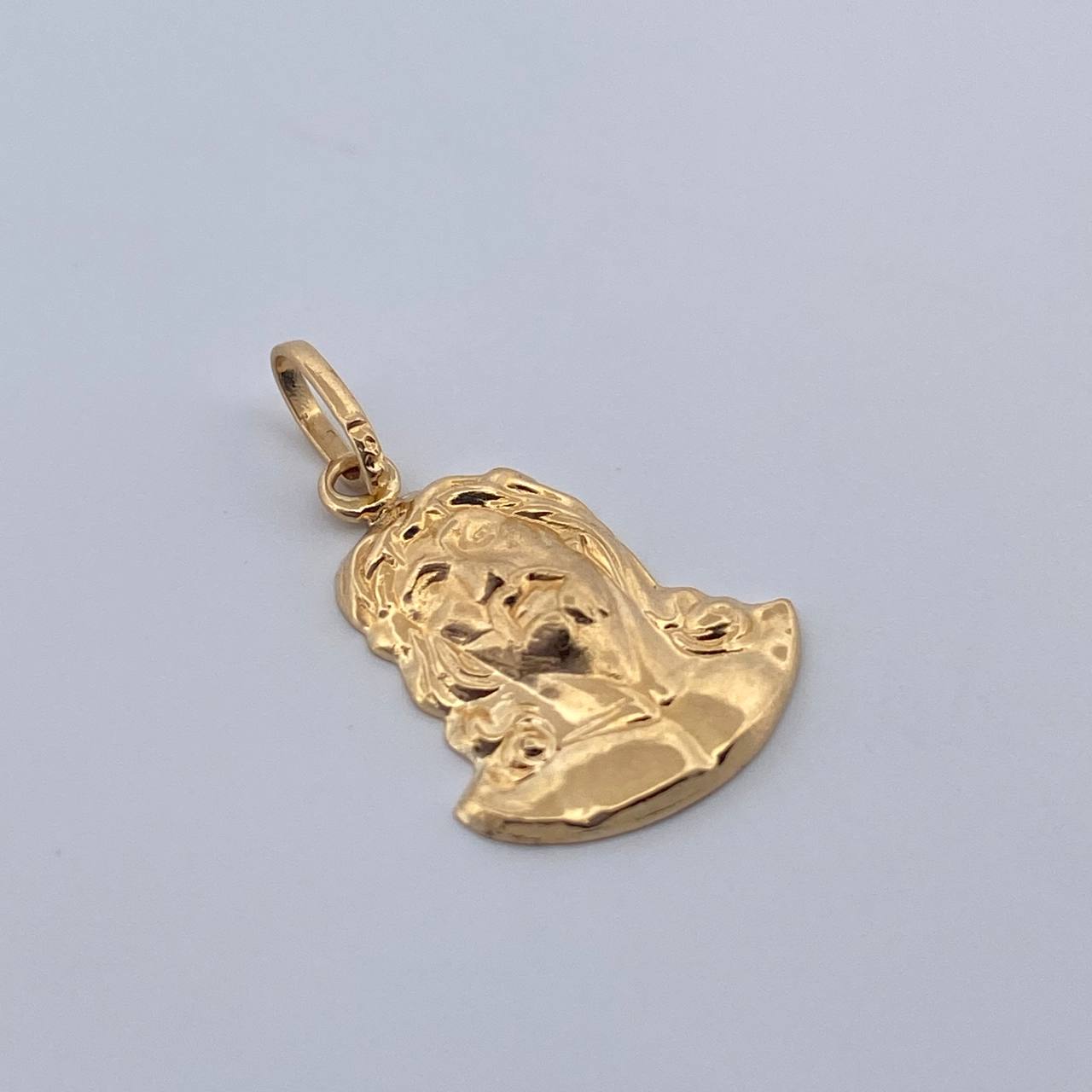 Dije Rostro Cristo 0.8gr / 2cm / Oro Amarillo 18K $