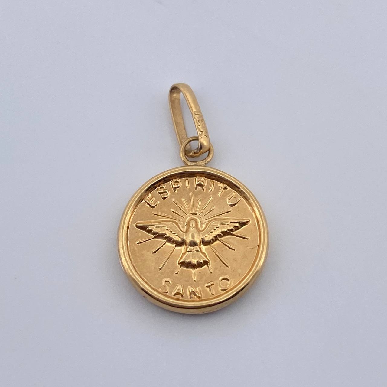 Dije Espiritu Santo 0.9gr / 2cm / Oro Amarillo 18K $