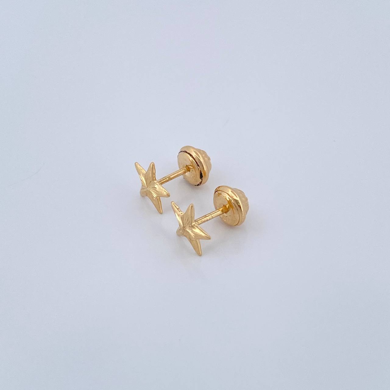 Topos Estrella 0.7gr / Oro Amarillo 18K &