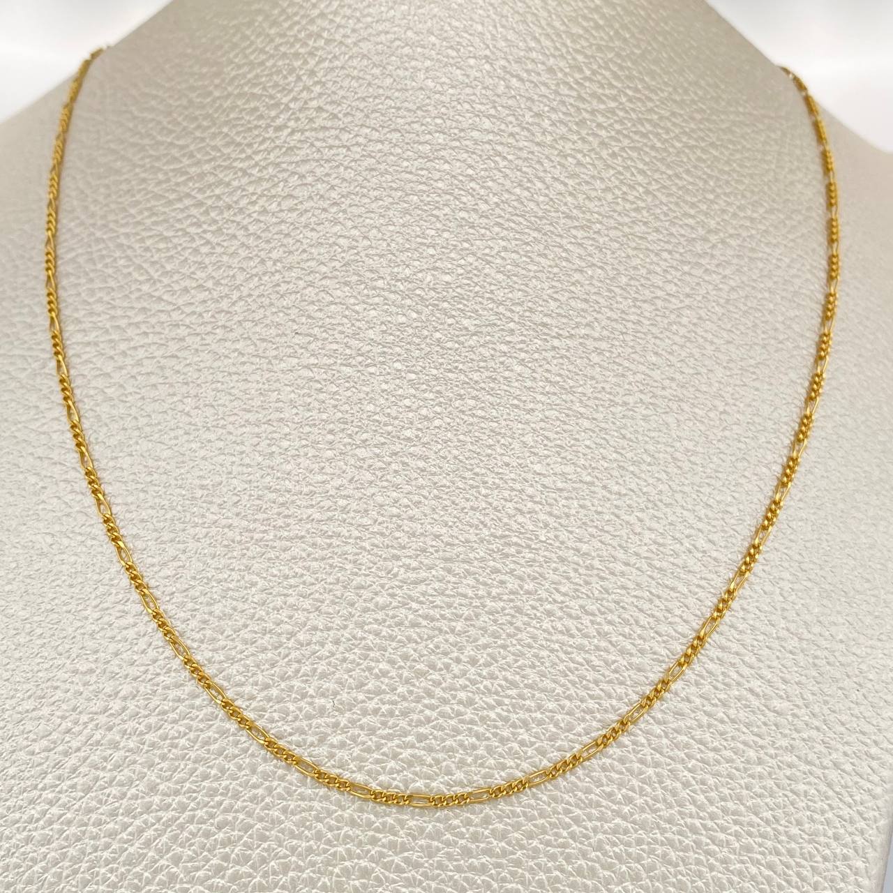 Cadena Figaro 1.45gr / 50.7cm / 1.32mm Oro Amarillo +1 18K $