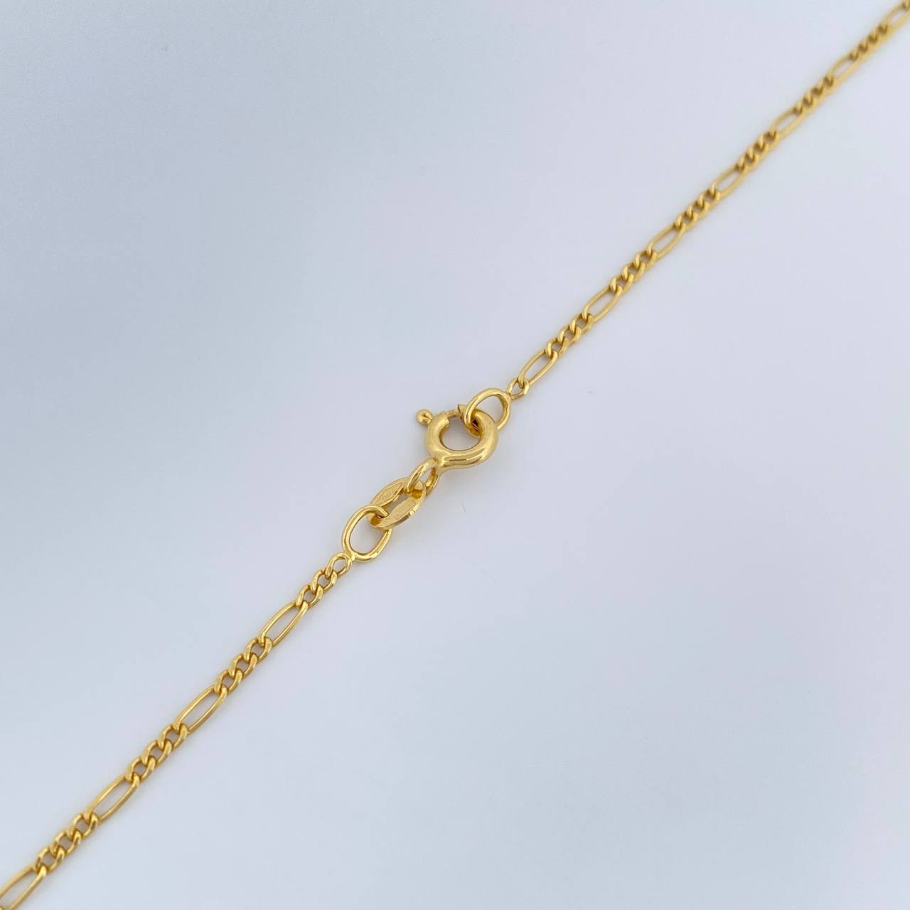 Cadena Figaro 1.4gr / 50.3cm / 1.35mm Oro Amarillo +1 18K $