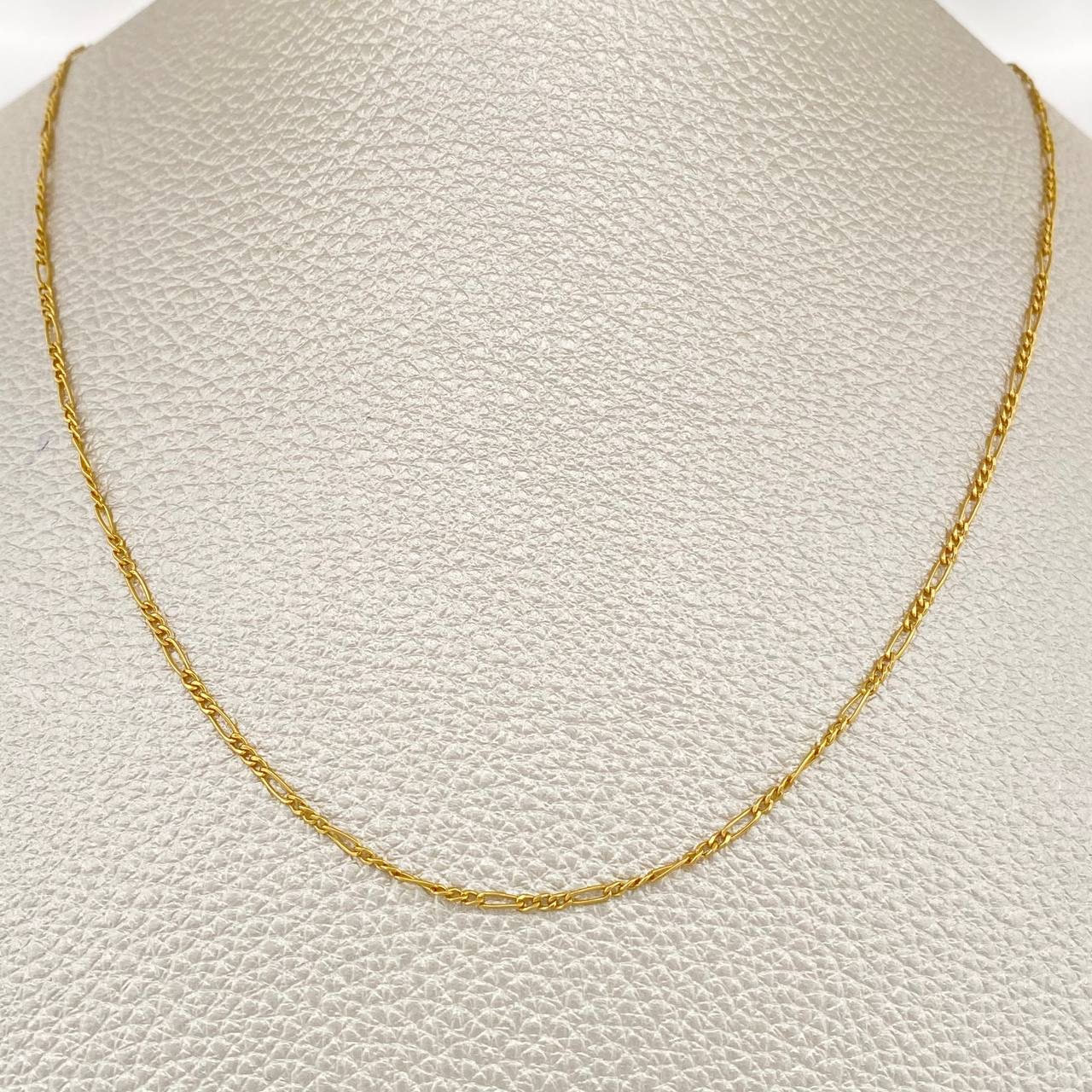 Cadena Figaro 1.4gr / 50.3cm / 1.35mm Oro Amarillo +1 18K $