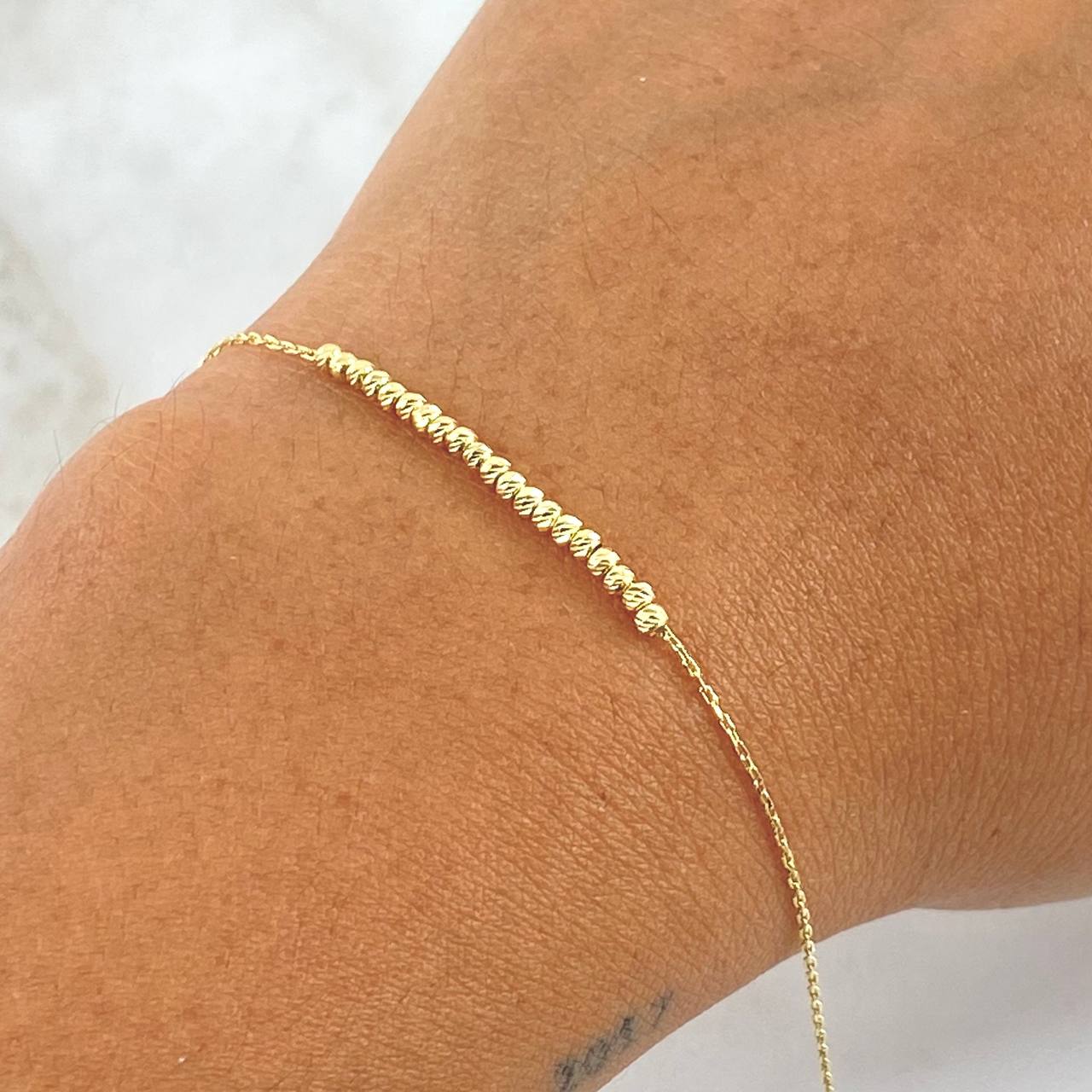 Pulso Aro Seguido 1.15gr / 15 - 18cm / 2mm Gradual Bolas Diamantadas Oro Amarillo +4 18K