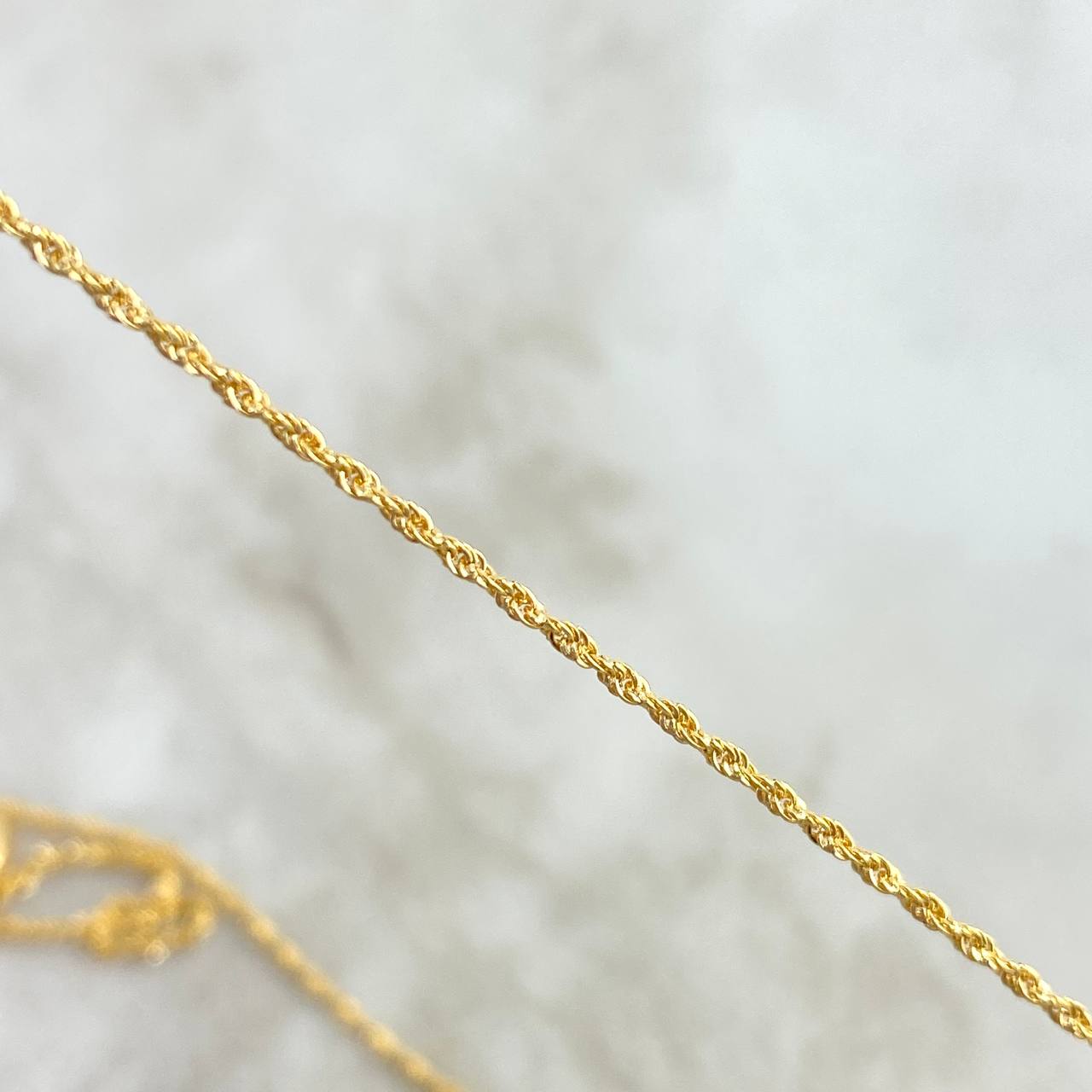 Cadena Lazo 1.05gr / 60cm + Dije Bolsa de Dinero 0.6gr / 2cm Oro Amarillo (Oferta)