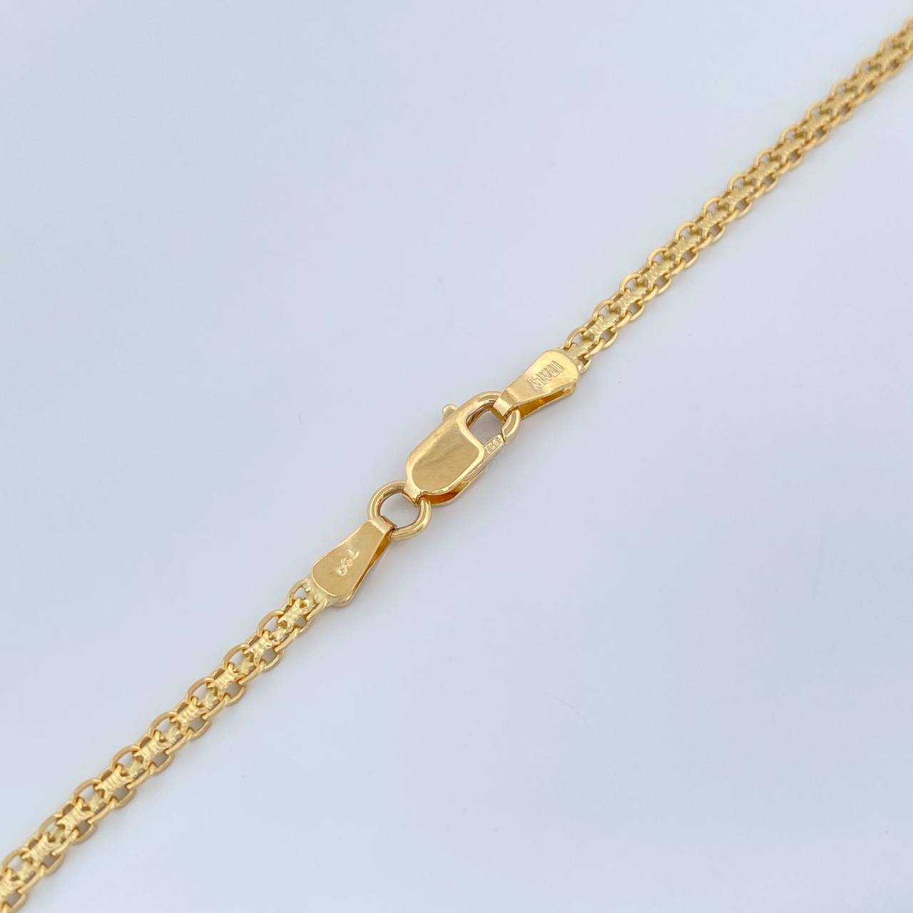 Cadena China 8.2gr / 60.5cm / 2.44mm Oro Amarillo +1 18K $