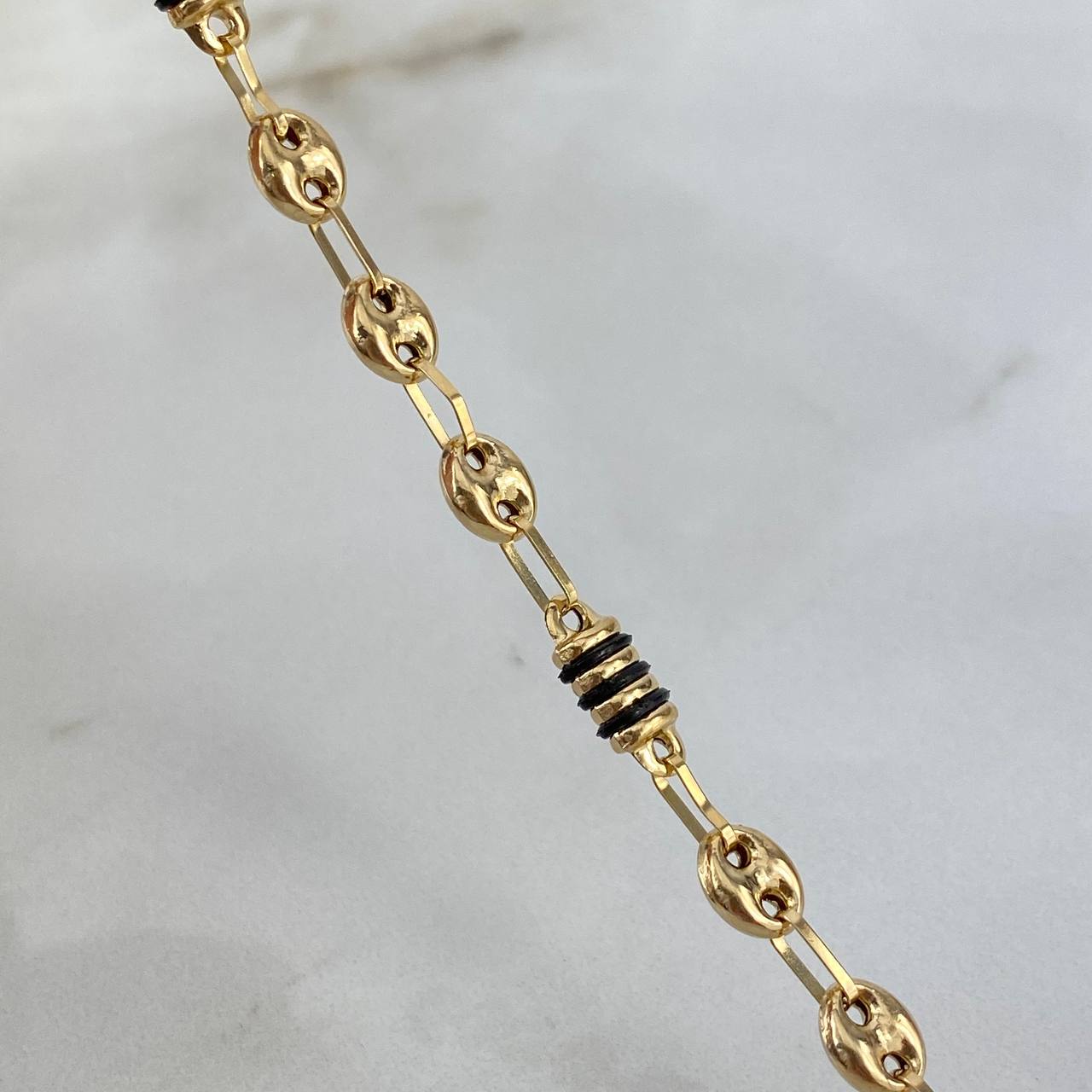 Pulso GC 4.2gr / 19cm / 4.5mm Barril Cauchos Negros Oro Amarillo©