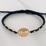 Pulsera Tejida Negra Placa 11-11 Oro Amarillo 18K