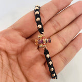 Pulsera Tejida Negra Pato Bolsas de Dinero Tres Oros 18K