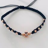 Pulsera Tejida Negra Pato Bolsas de Dinero Tres Oros 18K