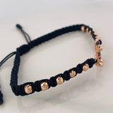 Pulsera Tejida Negra Pato Bolsas de Dinero Tres Oros 18K