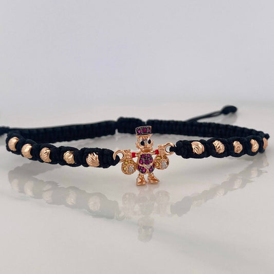 Pulsera Tejida Negra Pato Bolsas de Dinero Tres Oros 18K