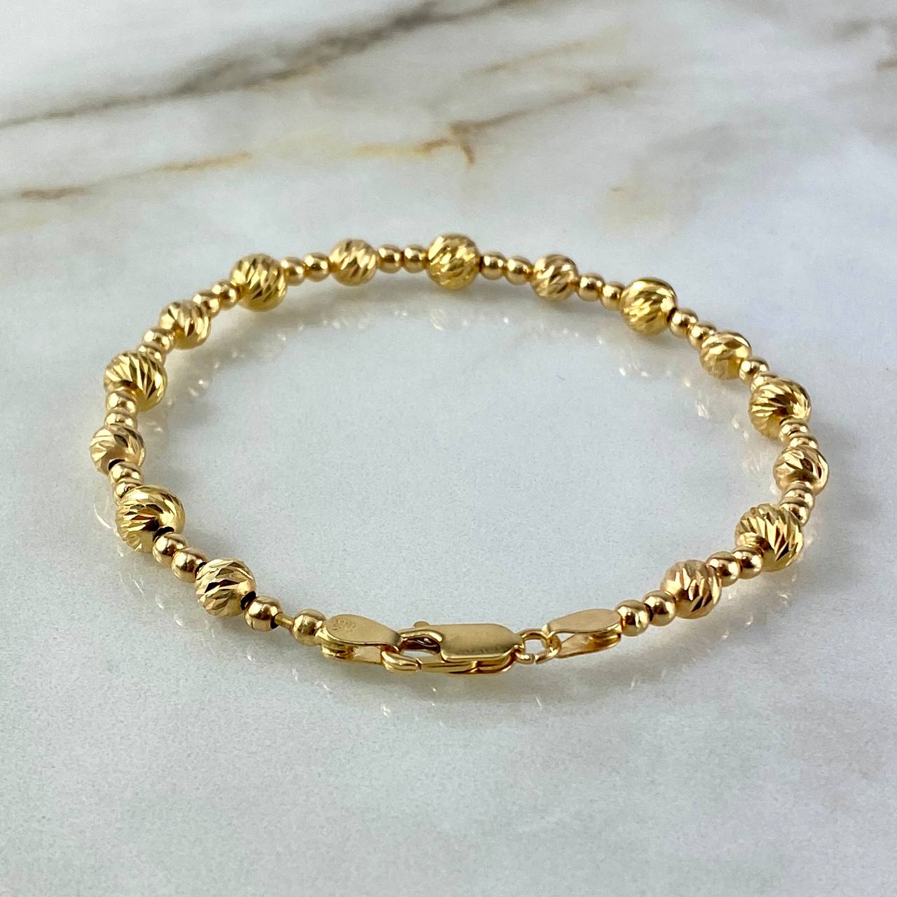 Pulso Bolas 8.25gr / 19cm / 3-5mm Lisas Diamantadas Oro Amarillo©