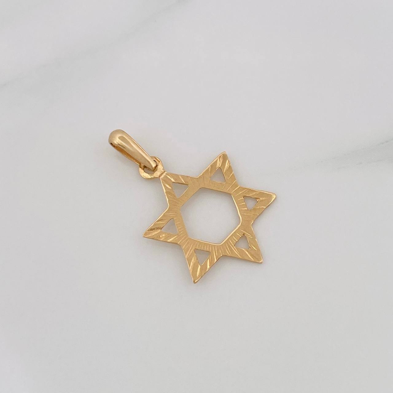 Dije Silueta Estrella 0.7g / 3.5cm Oro Amarillo 18K