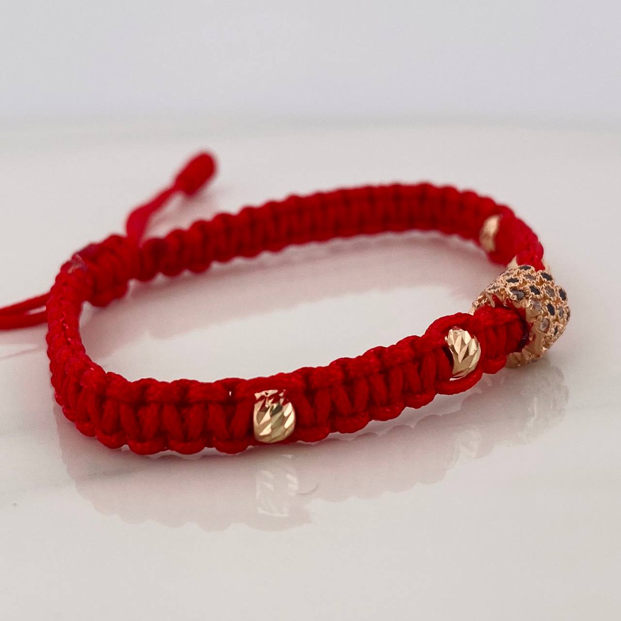 Pulsera Tejida Roja Cilindro Tupido Oro Rosa 18K