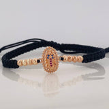 Pulsera Tejida Negra Virgen de Guadalupe Oro Rosa 18K